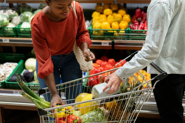 Man woman shopping grocery store